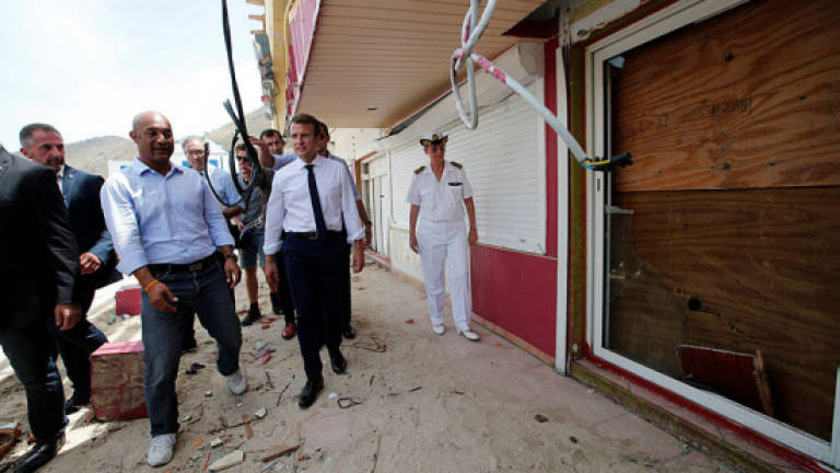 Macron, Johnson visit hurricane-hit Caribbean
