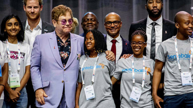 Elton John and Prince Harry launch bid to 'smash' AIDS stigma