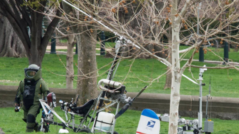Protester lands mini copter on US Capitol lawn