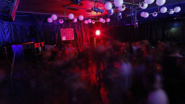 Dancing in the dark: New York club turns lights out