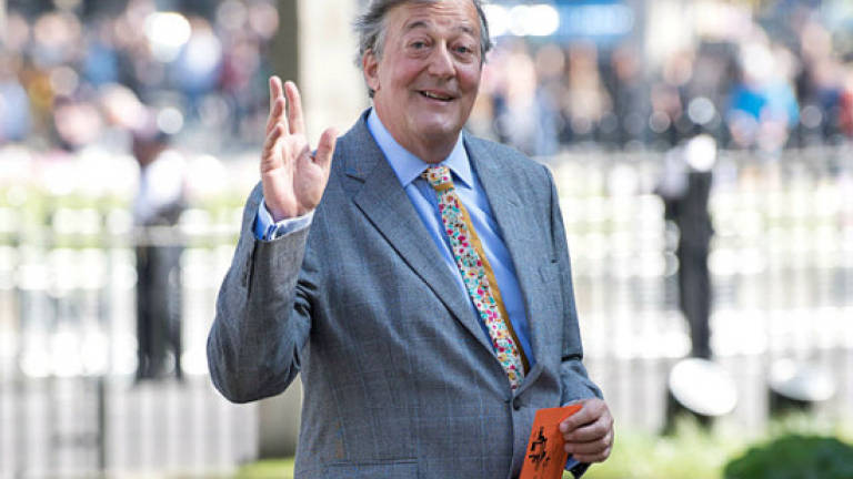 Actor Stephen Fry reveals battle with prostate cancer
