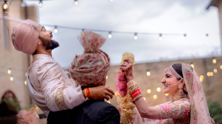 Indian cricketer Kohli, Bollywood's Sharma marry in Italy