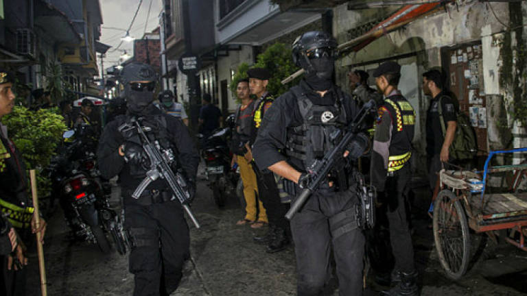 Indonesia arrests more than a dozen in pre-Christmas terror sweep