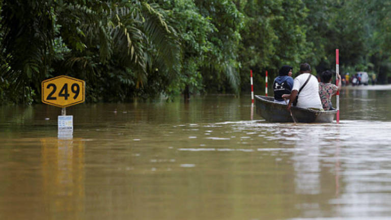 Sarawak floods claim first victim