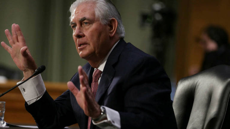 China muted after Tillerson vows islands blockade