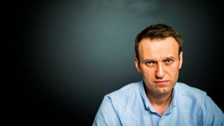 Russian opposition leader Navalny detained in Moscow ahead of rally