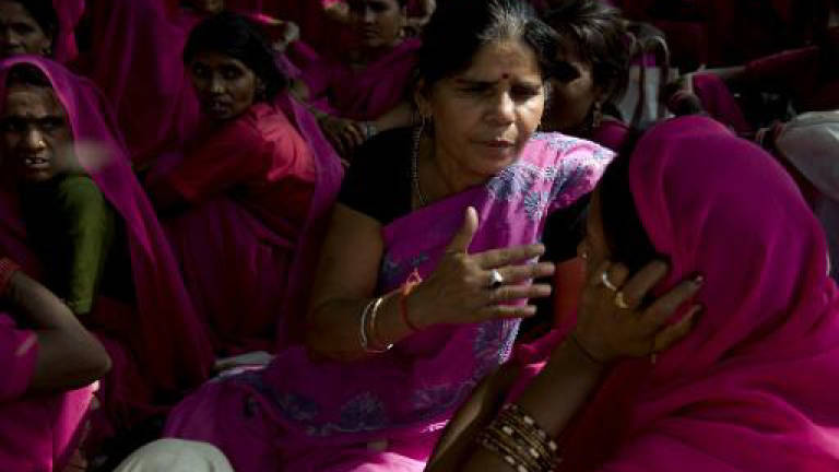 India court blocks release of film on pink sari vigilantes