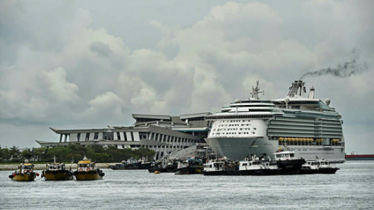 Singapore bans two Islamic preachers on religious cruises
