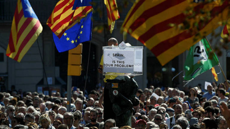 Angry protests in Barcelona as Spain rounds up Catalan officials