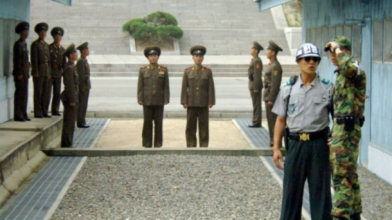 Axes, sunglasses and now a summit at Korea's DMZ