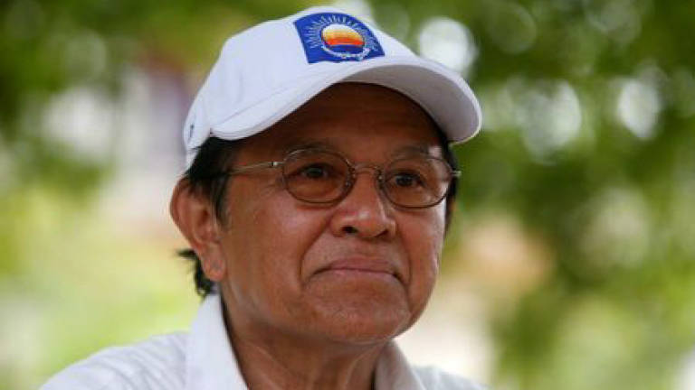 Cambodia opposition leader charged with treason