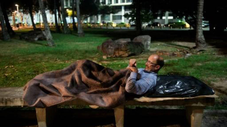 In Rio, office workers join the ranks of the homeless