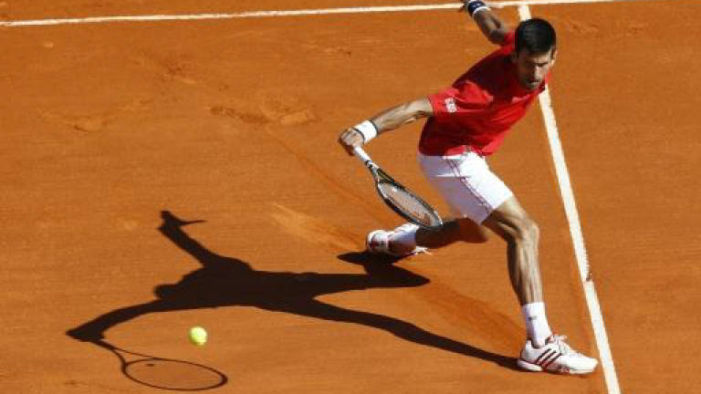 Murray insists Djokovic can be beaten as big four reunite in Madrid