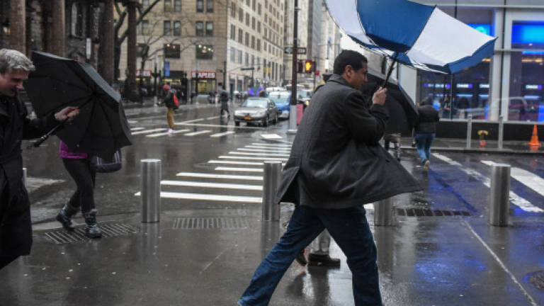At least 5 dead as storm brings wind, floods and snow to US Northeast