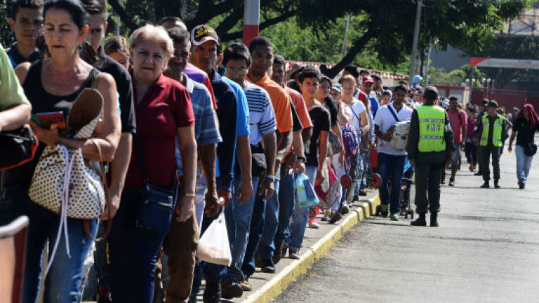 Venezuela reopens Colombia, Brazil border crossings