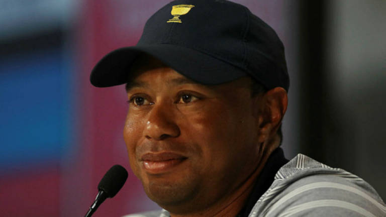 Woods swinging driver as rehab continues