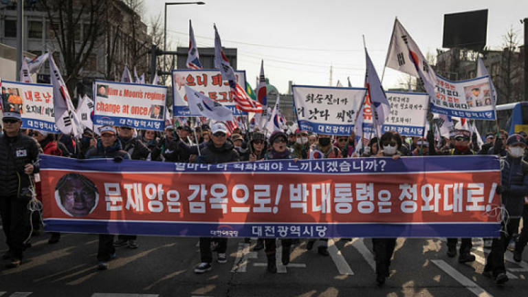 Relatives protest visit by N. Korea general blamed for warship sinking