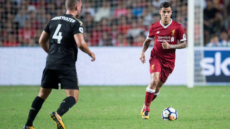 Liverpool's wantaway Coutinho reports for training