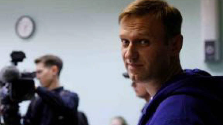 Jailed Kremlin foe Navalny calls for rallies on Putin's birthday