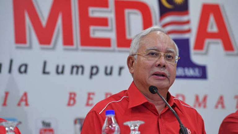 Najib remains tight lipped about polling date