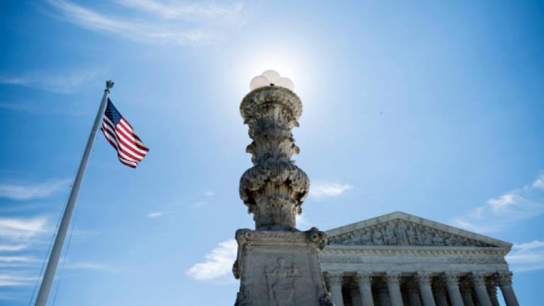 Supreme Court reinstates part of Trump travel ban