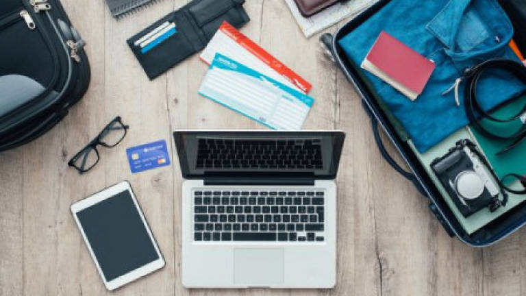 Laptops pose fire hazard in checked baggage and should be banned: report
