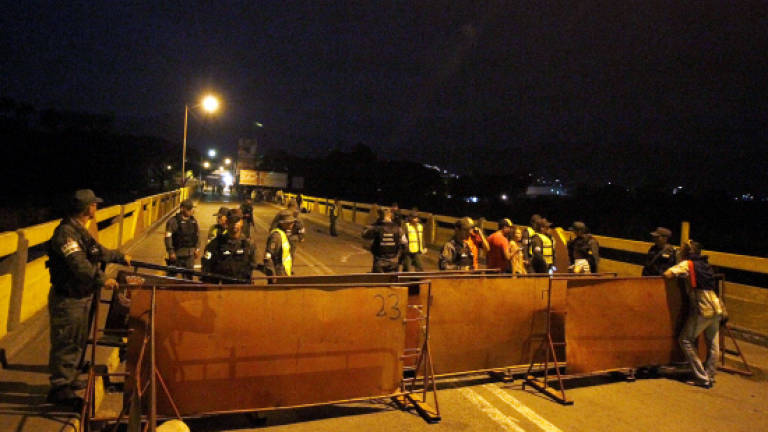 Maduro seals Venezuela-Colombia border, alleging plot