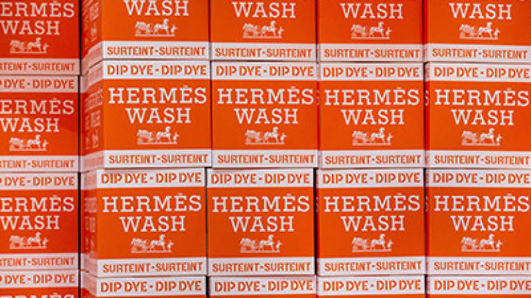Hermès' luxe silk scarf laundromat hits new destinations Hermès' luxe silk scarf laundromat hits new destinations