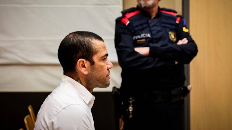 Brazilian footballer Dani Alves looks on at the start of his trial at the High Court of Justice of Catalonia in Barcelona, on February 5, 2024. - AFPPIX