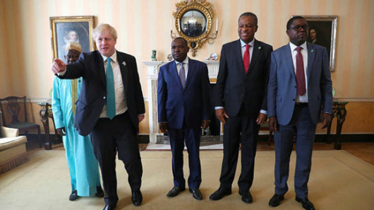 UK says would support Zimbabwe return to Commonwealth