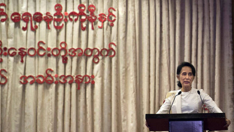 Myanmar's Suu Kyi breaks silence on killing of top lawyer