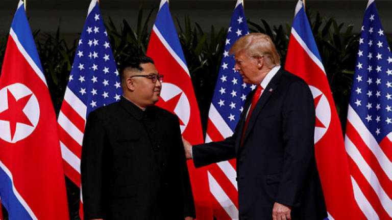 World can 'sleep well' after N.Korea summit, Trump says