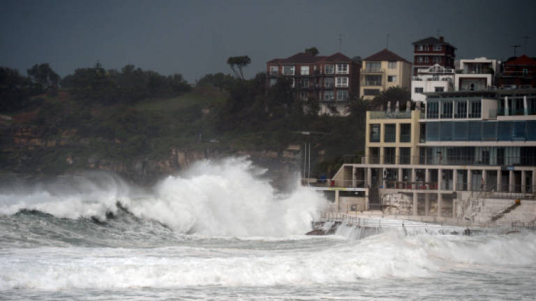 Wild weather smashes Australian state for third day