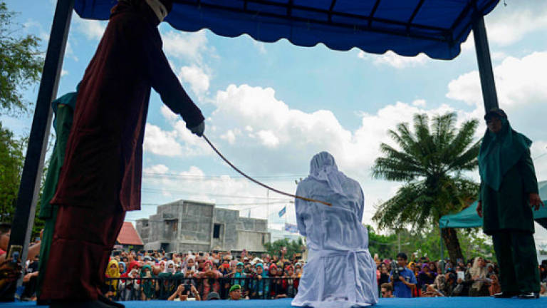 Amorous couples, sex workers whipped in Aceh