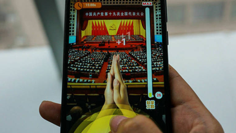 China mobile users tap phones to 'applaud' president's speech