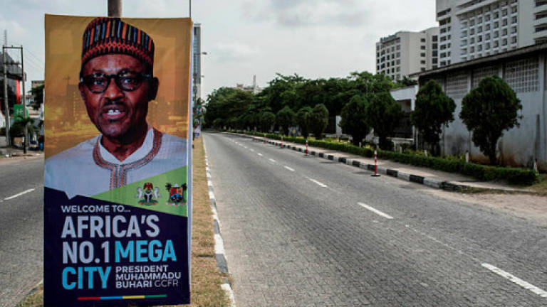Lagos on lockdown as Buhari makes historic visit
