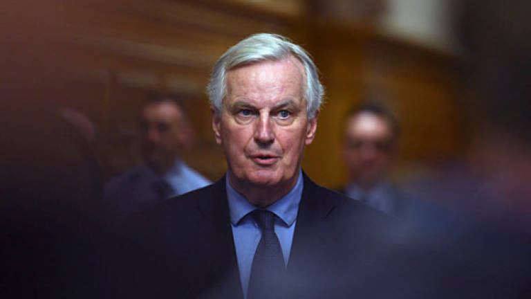 EU's Barnier urges UK to accept EU court deal for Brexit