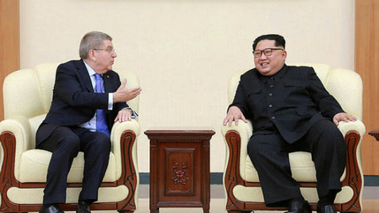 Kim says N. Korea to take part in 2020, 2022 Olympics: IOC chief