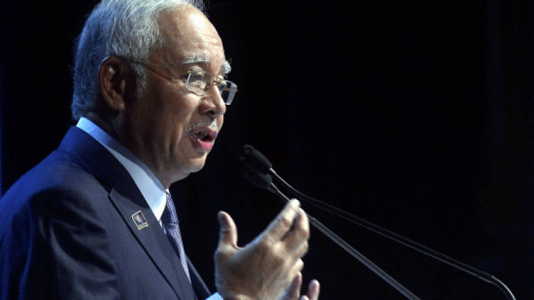 Najib makes new year vow of security, welfare