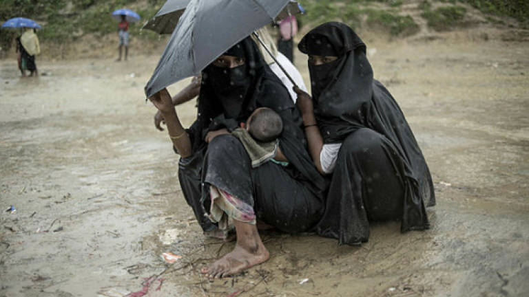 Bangladesh police hunt man who married Rohingya refugee