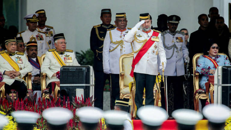 Agong attends trooping the colour ceremony