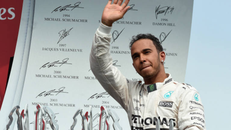 Hamilton praises team, dedicates win to his engineer