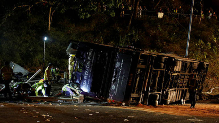 Hong Kong police probe deadly bus accident