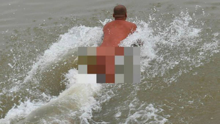 Hanoi's nudists bare all, defying social norms