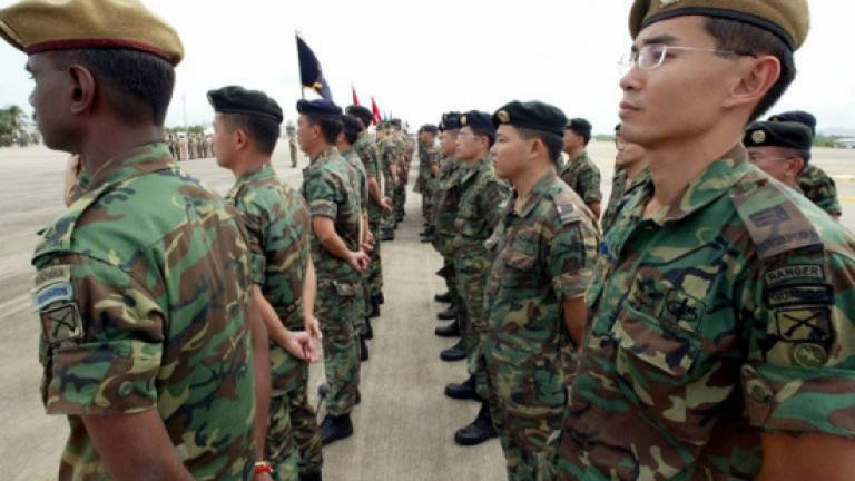 S’pore mandatory army training stays