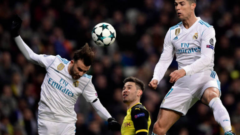 Ronaldo breaks new ground as Madrid edge out Dormund