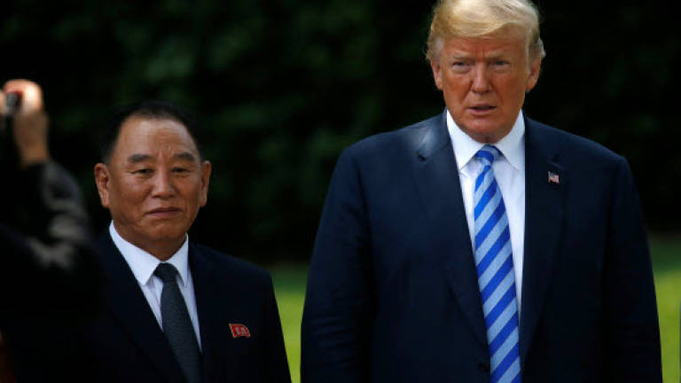 N. Korea summit back on, Trump says after meeting Kim envoy