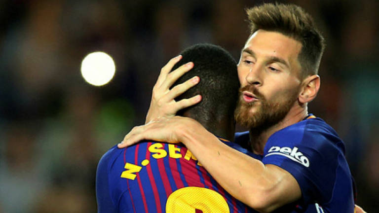 Messi hits four as Barca maintain perfect start