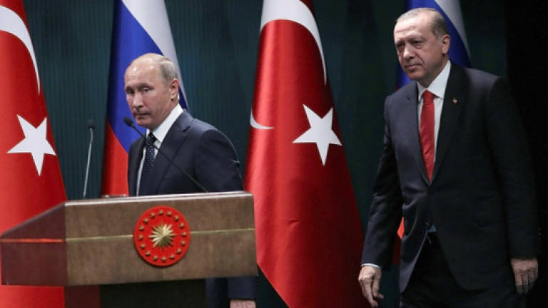 Erdogan, Putin agree joint push to end Syria war