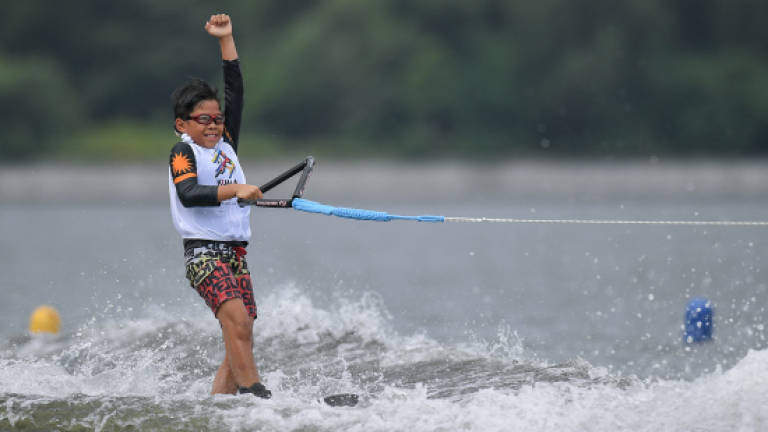 Young Adam Yoong shines with waterski tricks gold